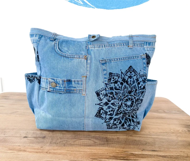 Eco-friendly denim tote bag made from upcycled jeans, light blue color
